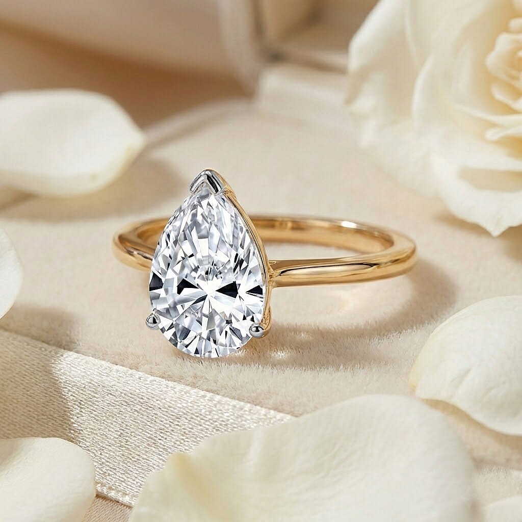 Luxuriant 14K Yellow Gold SGL Certified Lab Grown Diamond (VS-EF) Pear Cut Solitaire Ring