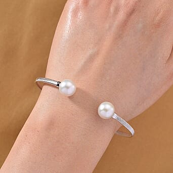 https://tjcuk.sirv.com/Products/82/4/8245350/Designer-Inspired-D-joy-Edison-Pearl-Cuff-Bangle-Size-8-in-Rhodium-Ove_8245350_1.jpg?w=342&h=342