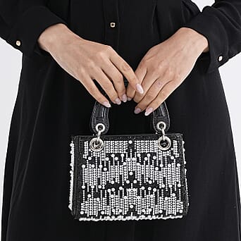 https://tjcuk.sirv.com/Products/82/5/8250747/Toggle-Clip-Crystal-Clutch-Bag-with-Handle-Drop-Black_8250747_3.jpg?w=342&h=342