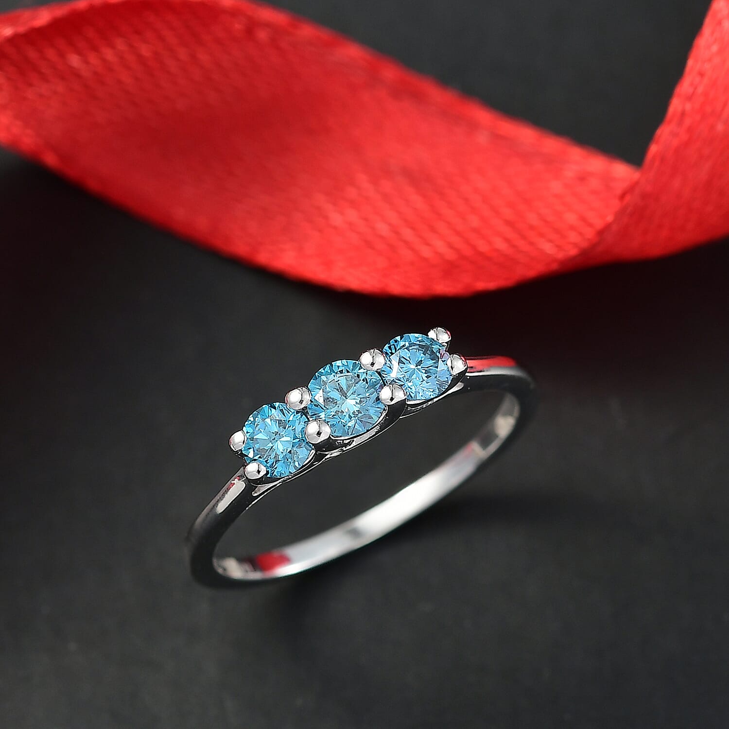 Luxuriant Lab Grown Blue Diamond (SI-G-H) 3 Stone Ring in Rhodium Overlay Sterling Silver 0.53 Ct.