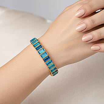 https://tjcuk.sirv.com/Products/82/6/8262421/Sea-Blue-Glass-Stretchable-Bracelet-Size-7-in-Yellow-Gold-Tone_8262421_2.jpg?w=342&h=342