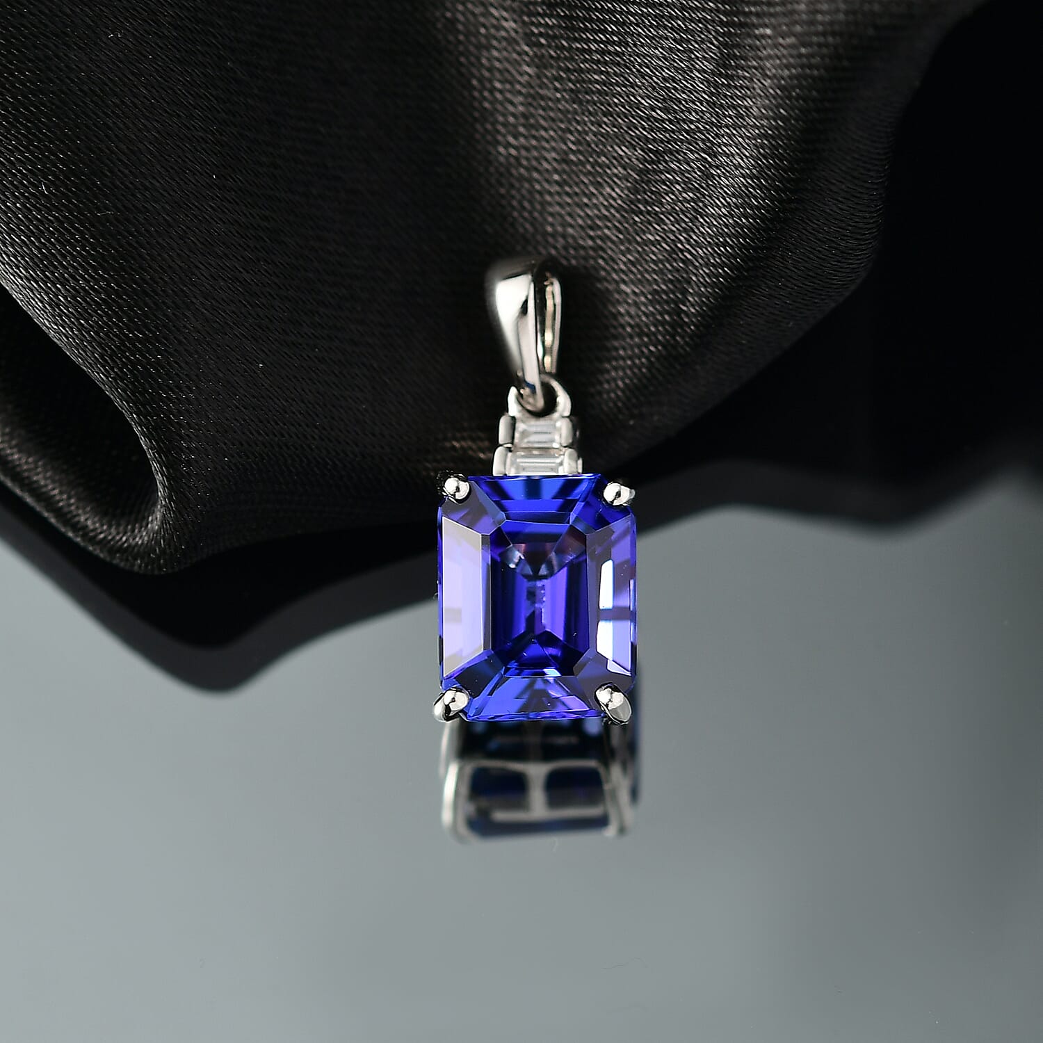 Rhapsody 950 Platinum AAAA Tanzanite & White Diamond (VS-EF) Solitaire Pendant 3.33 Ct.