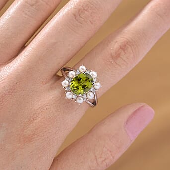 https://tjcuk.sirv.com/Products/82/6/8265483/D-Joy-Peridot-White-Pearl-Moissanite-Ring-in-Rhodium-Overlay-Sterling-_8265483_2.jpg?w=342&h=342