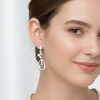 https://tjcuk.sirv.com/Products/82/7/8273412/Lucy-Q-Moissanite-Dangling-Earring-with-Push-Back-in-Rhodium-Overlay-S_8273412_2.jpg?w=342&h=342