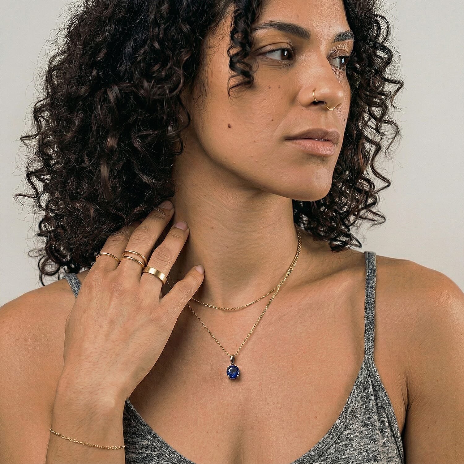 9K Yellow Gold AA Fissure Filled Blue Sapphire Pendant 1.22 Ct.