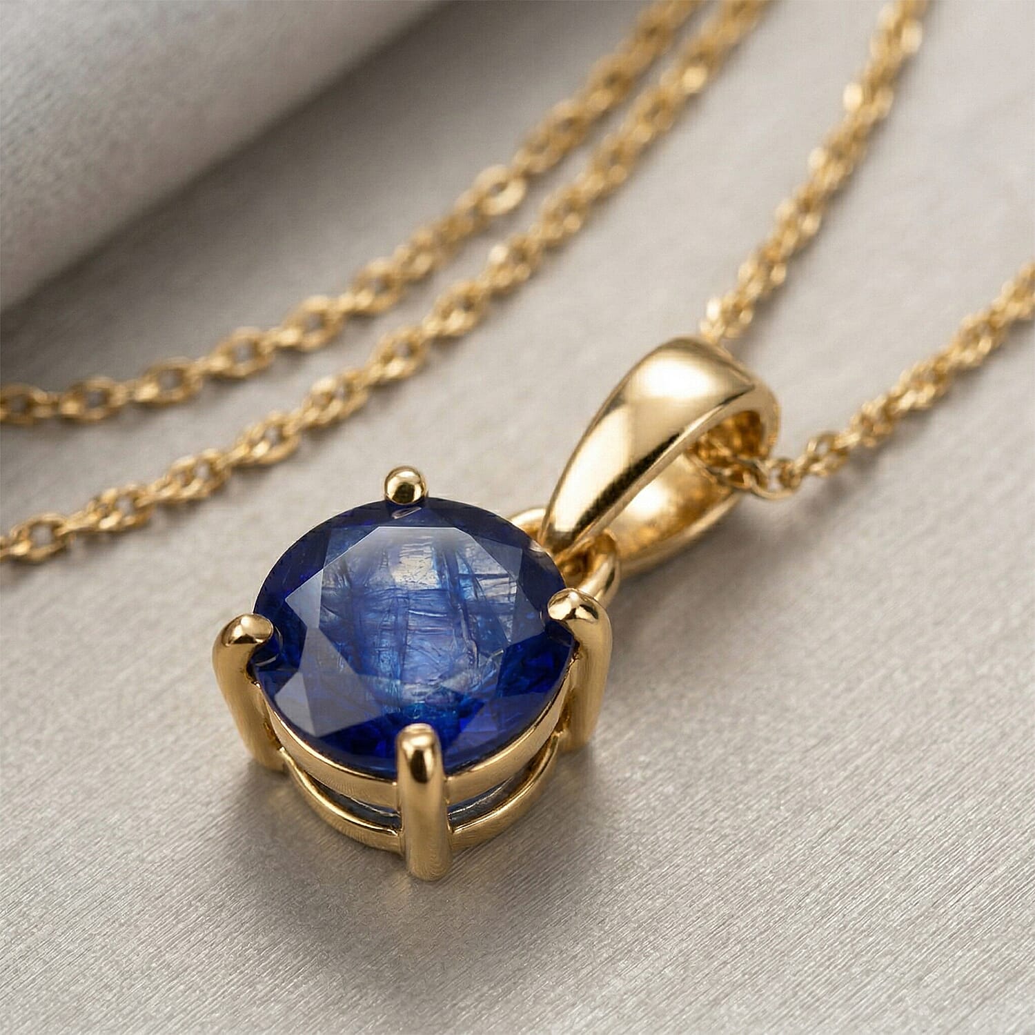 9K Yellow Gold AA Fissure Filled Blue Sapphire Pendant 1.22 Ct.