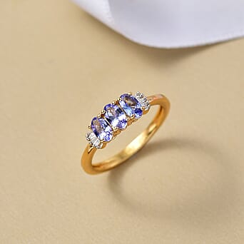 https://tjcuk.sirv.com/Products/82/7/8276951/Tanzanite-White-Diamond-3-Stone-Ring-Sterling-Silver-0-718-Ct_8276951_1.jpg?w=342&h=342
