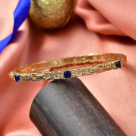Byzantine Bangle  Masoala Blue Sapphire (Size-7.5) in Yellow Gold Tone