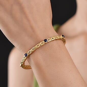 https://tjcuk.sirv.com/Products/82/8/8285510/EverTrue-Masoala-Sapphire-Full-Bangle-Pure-Yellow-Brass-1-350-Ct_8285510_2.jpg?w=342&h=342