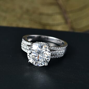 https://tjcuk.sirv.com/Products/82/9/8290013/D-Joy-Moissanite-Main-Stone-With-Side-Stone-Ring-in-Rhodium-OverlaySte_8290013_1.jpg?w=342&h=342