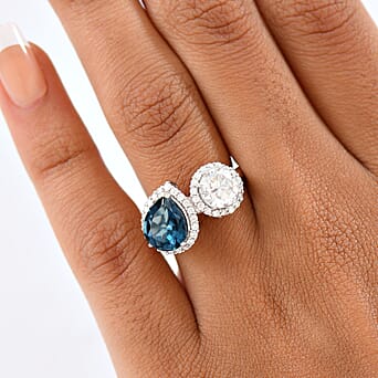 https://tjcuk.sirv.com/Products/82/9/8296241/D-Joy-London-Blue-Topaz-Moissanite-Fancy-Ring-in-Rhodium-OverlaySterli_8296241_2.jpg?w=342&h=342