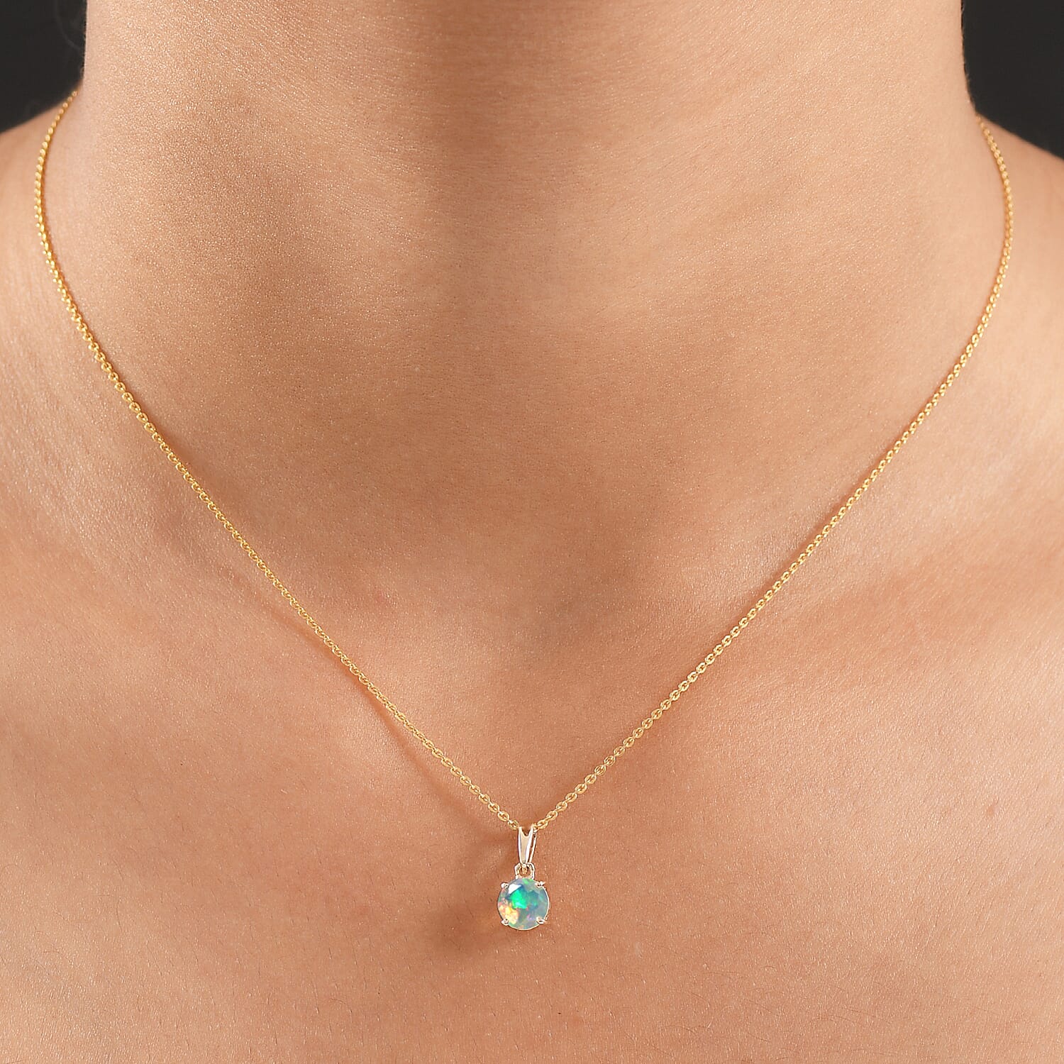 9K Yellow Gold AA Ethiopian Opal Pendant 0.53 Ct.