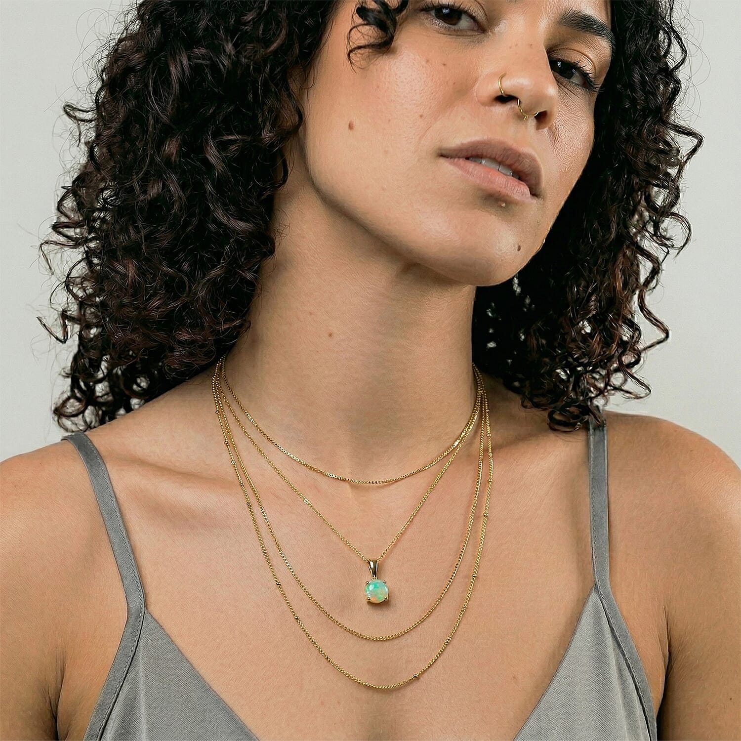 9K Yellow Gold AA Ethiopian Opal Pendant 0.53 Ct.