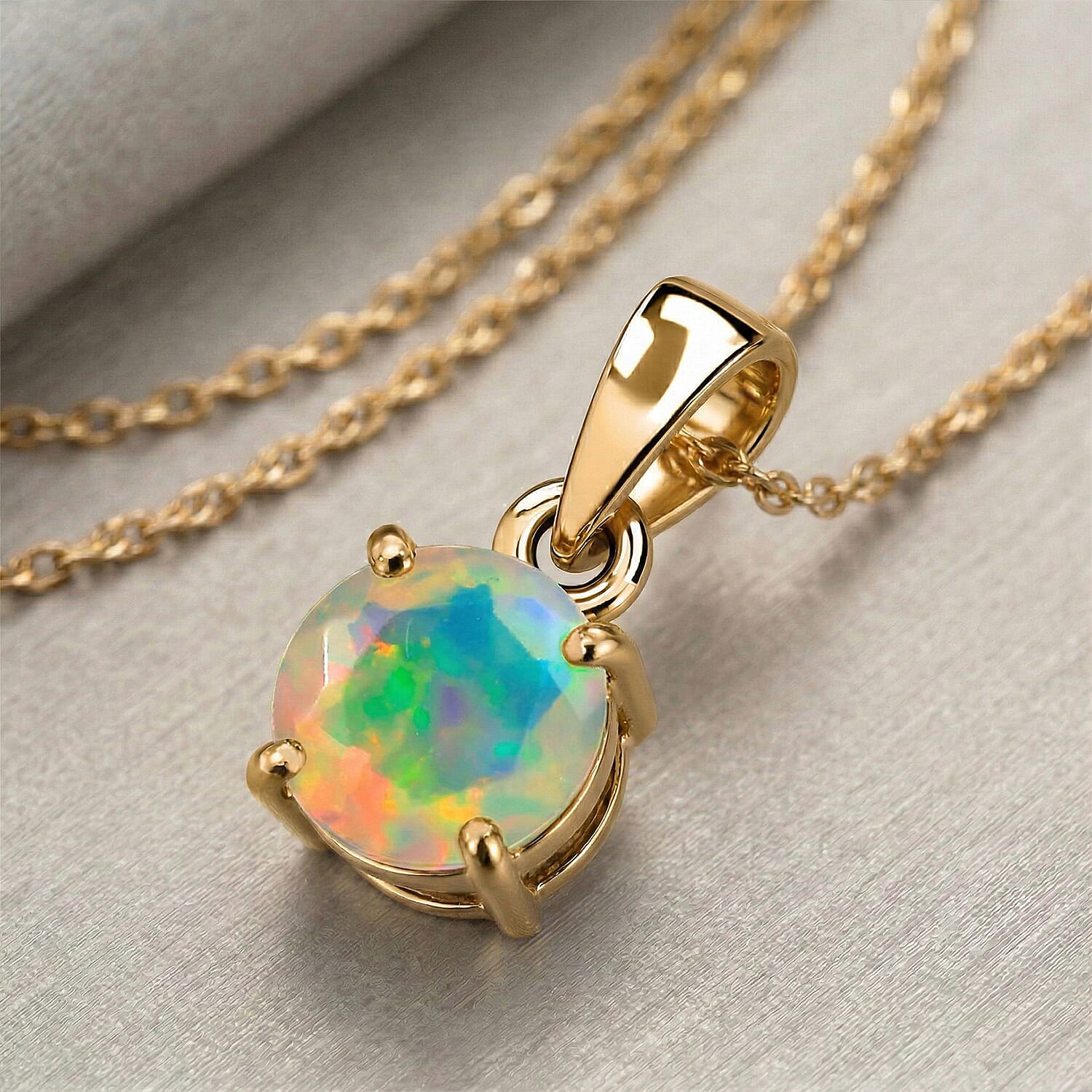 9K Yellow Gold AA Ethiopian Opal Pendant 0.53 Ct.