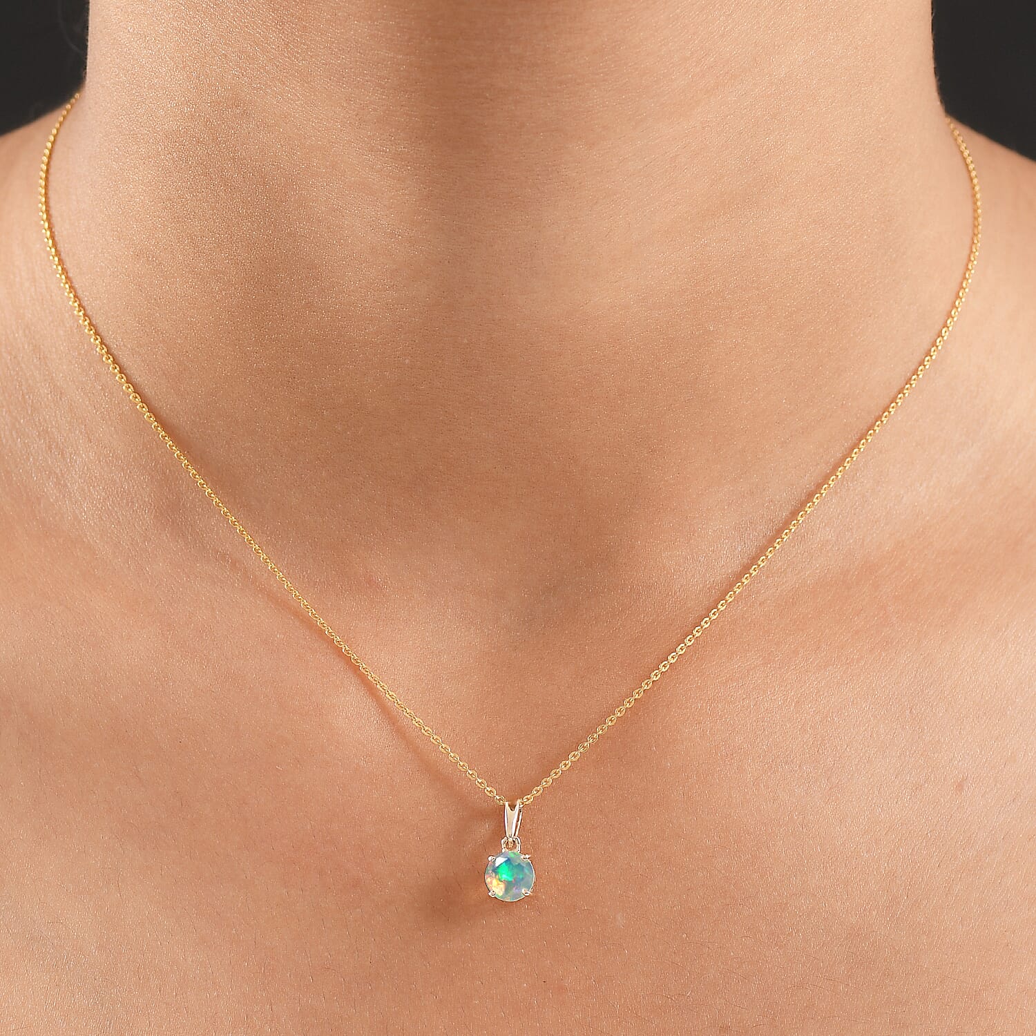9K Yellow Gold AA Ethiopian Opal Pendant 0.53 Ct.