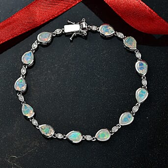 https://tjcuk.sirv.com/Products/82/9/8299556/D-Joy-Ethiopian-Opal-Moissanite-Tennis-Bracelet-1-Row-Size-7-5-with-GB_8299556_1.jpg?w=342&h=342
