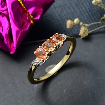 https://tjcuk.sirv.com/Products/83/0/8300220/Orange-Sapphire-3-Stone-Ring-in-18K-YG-PlatingSterling-Silver-0-696-Ct_8300220_1.jpg?w=342&h=342