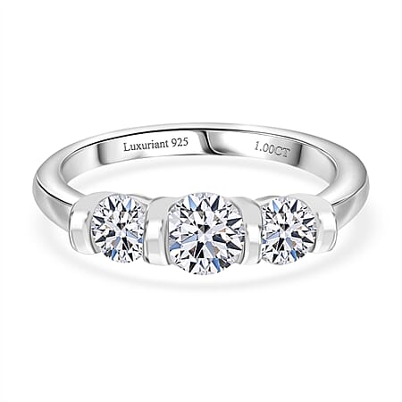 Luxuriant Round Cut Lab Grown Diamond (SI-GH) Trilogy Ring in Rhodium Overlay Plated Sterling Silver 1.00 Ct. Luxuriant Round Cut Lab Grown Diamond (SI-GH) Trilogy Ring in Rhodium Overlay Plated Sterling Silver 1.00 Ct.