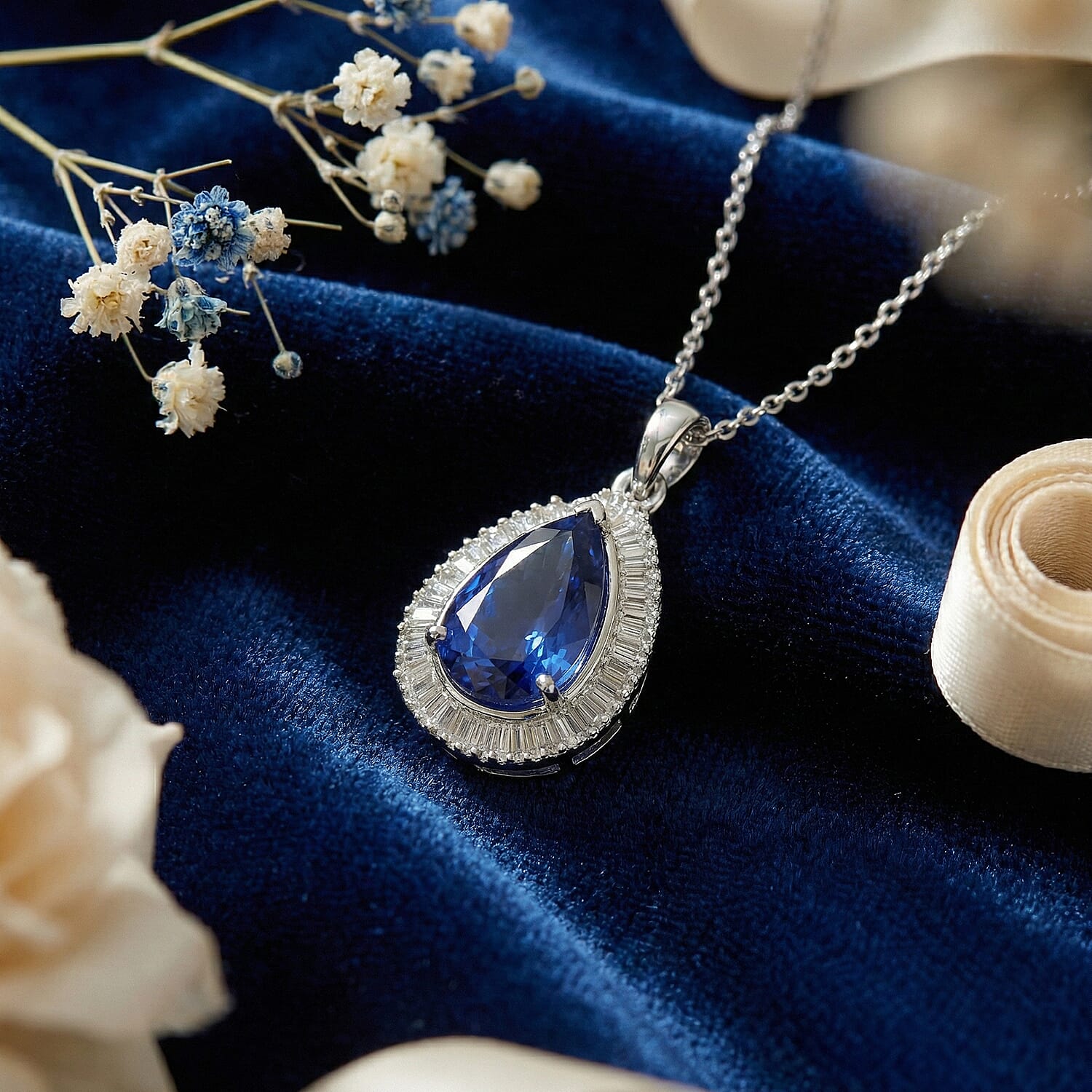 RHAPSODY 950 Platinum AAAA Tanzanite and Natural Diamond (VS-EF) Pear Cut Halo Pendant 3.00 Ct. Platinum Wt. 3.01 Gms