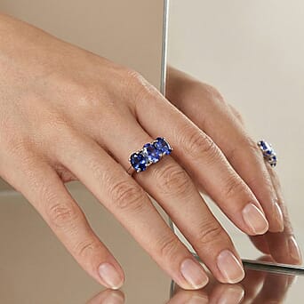 https://tjcuk.sirv.com/Products/83/5/8358317/Rhapsody-950-Platinum-AAAA-Tanzanite-Trilogy-Ring-4-00-Ct-Platinum-Wt-_8358317_2.jpg?w=342&h=342