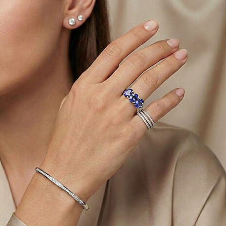 Rhapsody 950 Platinum AAAA Tanzanite Trilogy Ring 4.00 Ct, Platinum Wt. 5.00 Gms