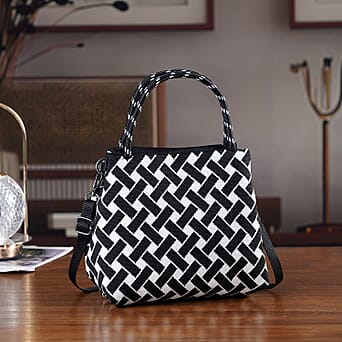 https://tjcuk.sirv.com/Products/84/1/8415363/Geometric-Woven-Pattern-Handbag-with-Shoulder-Strap-130cm-Black-White_8415363_1.jpg?w=342&h=342