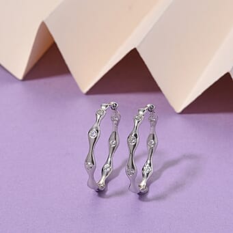 https://tjcuk.sirv.com/Products/84/7/8479065/Lucy-Q-Lab-Grown-Diamond-Hoop-Earring-in-Rhodium-Overlay-Sterling-Silv_8479065_1.jpg?w=342&h=342