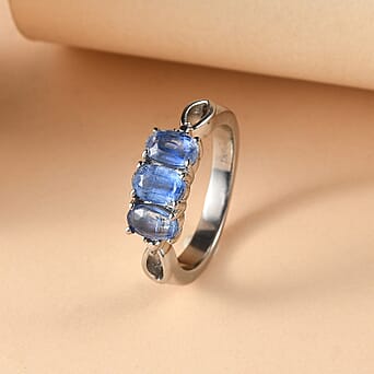 https://tjcuk.sirv.com/Products/84/7/8479513/Close-Out-Deal-Kyanite-Oval-Cut-Trilogy-Ring-1-79-Ct_8479513_2.jpg?w=342&h=342