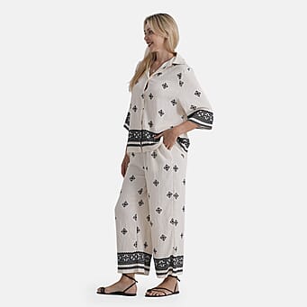 https://tjcuk.sirv.com/Products/84/8/8480556/La-Marey-Printed-Jean-and-Pant-Trouser-Size-S-M-White-Black_8480556_3.jpg?w=342&h=342
