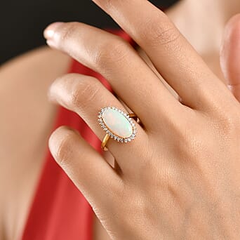 https://tjcuk.sirv.com/Products/84/8/8482904/Luxuriant-Ethiopian-Opal-SI-G-H-Lab-Grown-Diamond-Halo-Ring-in-18K-Ver_8482904_1.jpg?w=342&h=342