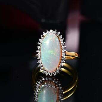 https://tjcuk.sirv.com/Products/84/8/8482904/Luxuriant-Ethiopian-Opal-SI-G-H-Lab-Grown-Diamond-Halo-Ring-in-18K-Ver_8482904_2.jpg?w=342&h=342
