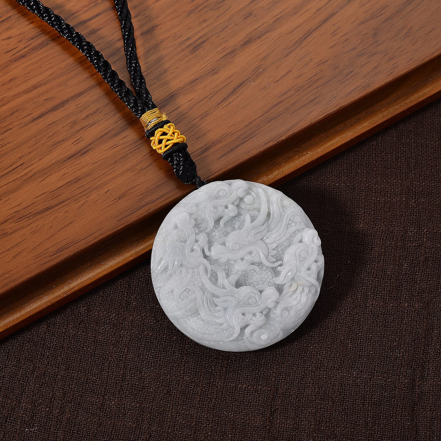 Vista Crest Natural White - Light Green Jade Hand-Carved Dragon with Black Cotton Cord 75.00 Gms