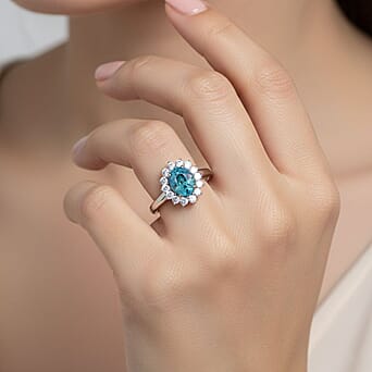 https://tjcuk.sirv.com/Products/85/0/8502116/Luxuriant-Lab-Grown-Diamond-Blue-Zircon-Halo-Ring-in-Rhodium-Overlay-S_8502116_1.jpg?w=342&h=342