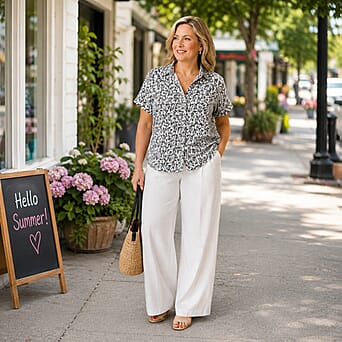 https://tjcuk.sirv.com/Products/85/0/8504307/Emma-Ladies-Short-Sleeve-Button-Thru-Shirt-Size-14-White-Black_8504307_1.jpg?w=342&h=342