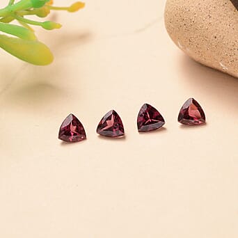 https://tjcuk.sirv.com/Products/85/0/8508173/Set-Of-4-Rhodolite-Garnet-Trillion-4-5-mm-Gemstone-1-64-Ct_8508173_1.jpg?w=342&h=342