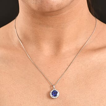 https://tjcuk.sirv.com/Products/85/0/8508237/Rhapsody-950-Platinum-AAAA-Tanzanite-VS-E-F-White-Diamond-Pendant-4-71_8508237_1.jpg?w=342&h=342