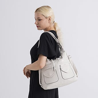 https://tjcuk.sirv.com/Products/85/1/8519687/Designer-Inspired-Womens-Multi-Pocket-Crossbody-Hobo-Bag-White_8519687_2.jpg?w=342&h=342