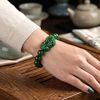 https://tjcuk.sirv.com/Products/85/1/8519747/Green-Jade-Beads-Curving-Cut-Adjustable-Bracelet-Size-7-5-300-00-Ct_8519747_1.jpg?w=342&h=342