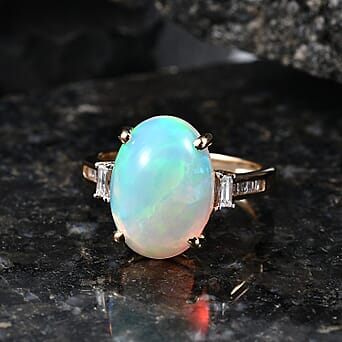 https://tjcuk.sirv.com/Products/85/2/8524249/9K-Yellow-Gold-AAA-Ethiopian-Opal-White-Diamond-I3-Main-Stone-With-Sid_8524249_2.jpg?w=342&h=342