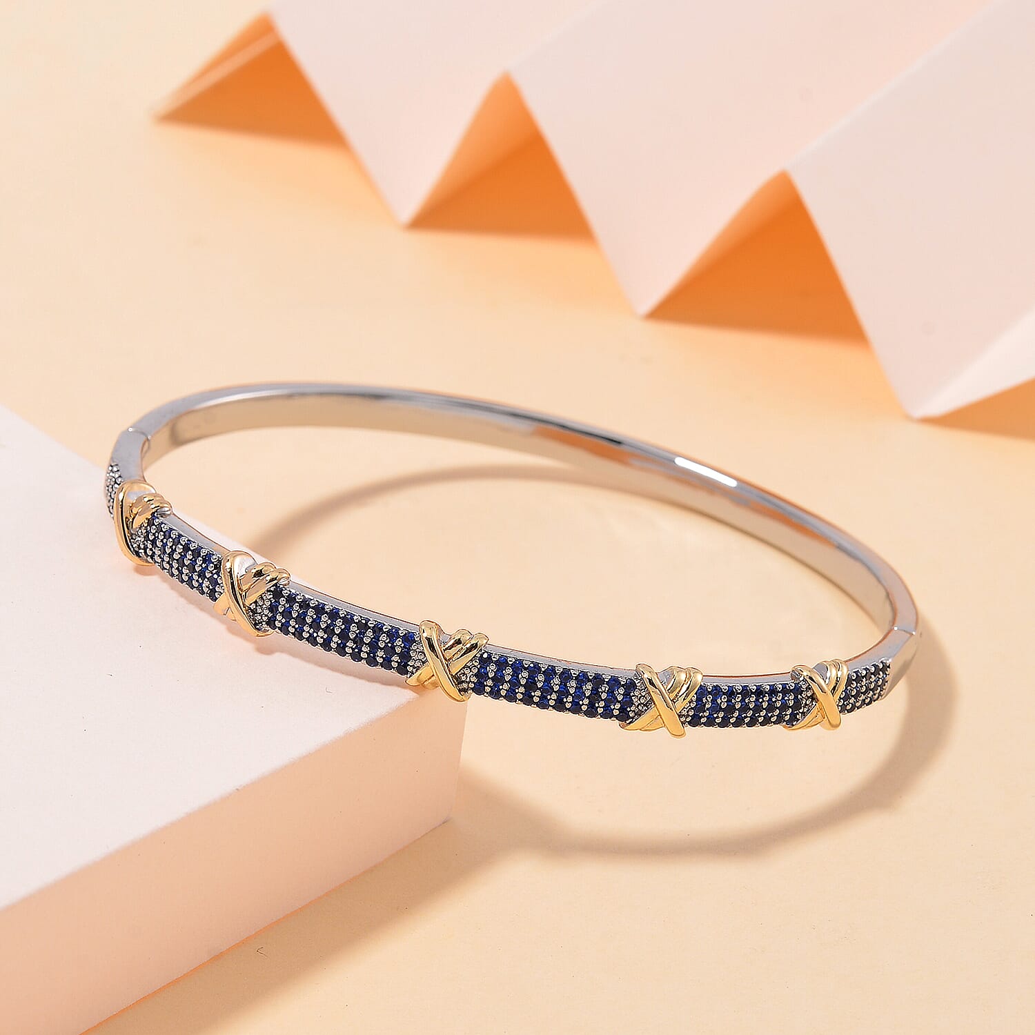 Blue Cubic Zirconia Criss Cross Bangle (Size - 7.5) 10.00 Ct.