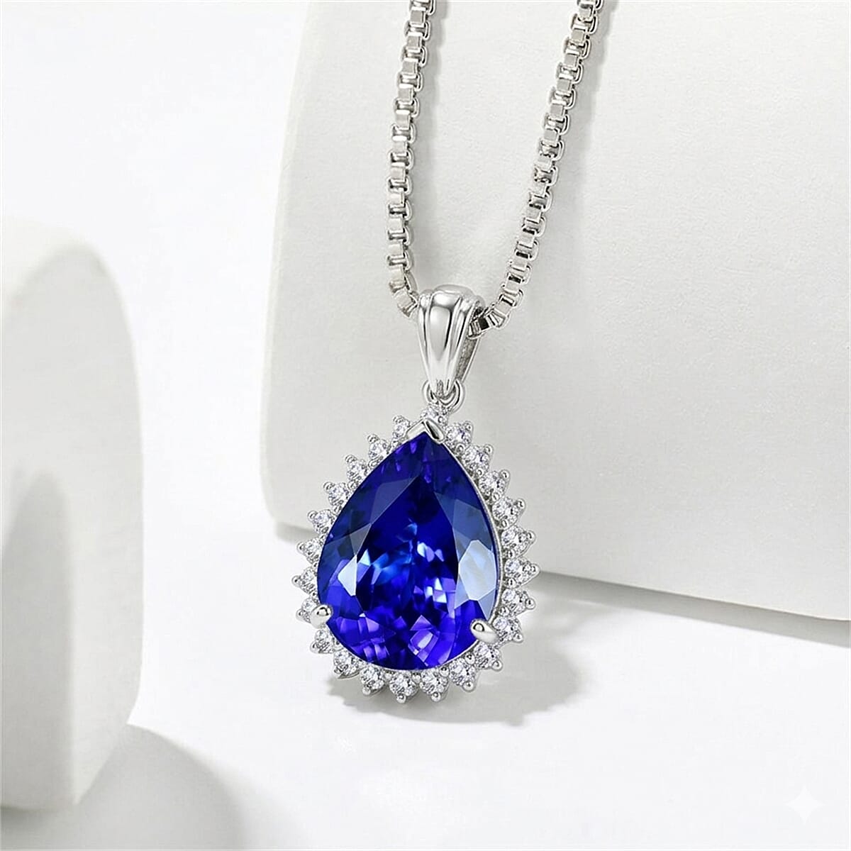Rhapsody - 950 Platinum AAAA Tanzanite & VS-E-F White Diamond Pear Cut Halo Pendant 11.90 Ct, Platinum Wt. 5.50 Gms