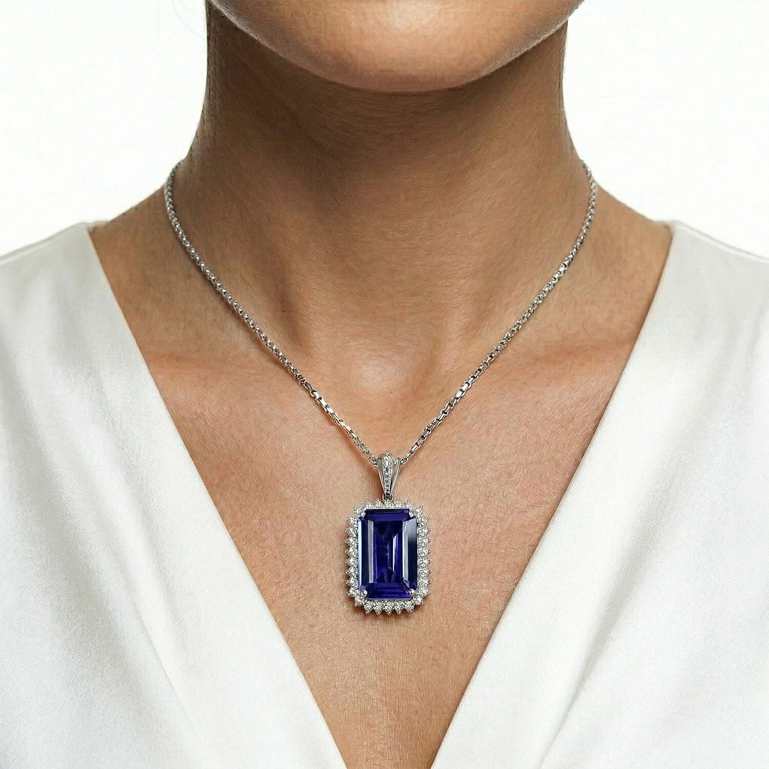 Rhapsody - 950 Platinum AAAA Tanzanite & VS-E-F White Diamond Halo Pendant 14.57 Ct, Platinum Wt. 5.66 Gms