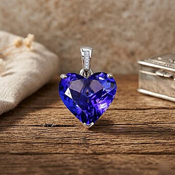 https://tjcuk.sirv.com/Products/85/3/8539869/Rhapsody-950-Platinum-AAAA-Tanzanite-White-Diamond-EF-VS2-Main-Stone-W_8539869_2.jpg?w=342&h=342