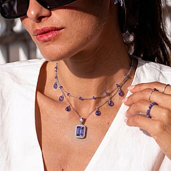 https://tjcuk.sirv.com/Products/85/4/8548461/RHAPSODY-950-Platinum-AAAA-Tanzanite-Natural-Diamond-VS-E-F-Halo-Penda_8548461_2.jpg?w=342&h=342