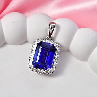 https://tjcuk.sirv.com/Products/85/4/8548461/Rhapsody-950-Platinum-AAAA-Tanzanite-VS-E-F-White-Diamond-Taper-Baguet_8548461_2.jpg?w=342&h=342