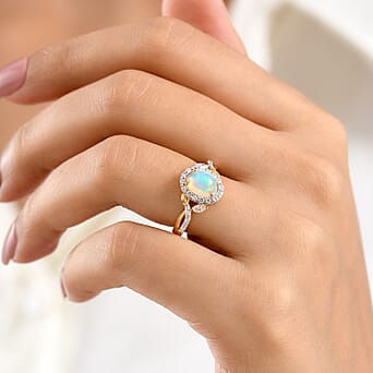 https://tjcuk.sirv.com/Products/85/6/8565279/Royal-Bali-Collection-D-Joy-Ethiopian-Opal-Moissanite-Ring-in-18K-Verm_8565279_1.jpg?w=342&h=342
