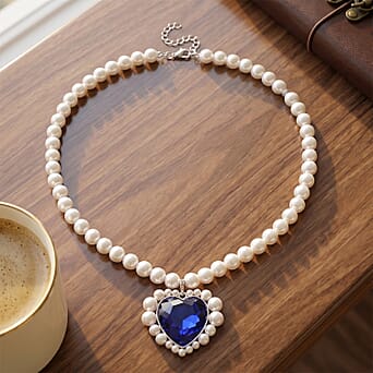 https://tjcuk.sirv.com/Products/85/7/8579432/Blue-Glass-White-Crystal-White-Shell-Pearl-Heart-Necklace-Size-20-2-Ex_8579432_1.jpg?w=342&h=342
