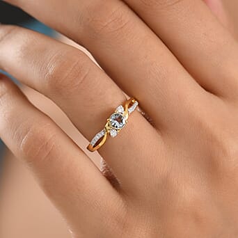 https://tjcuk.sirv.com/Products/85/8/8587984/D-Joy-Aquamarine-Moissanite-Main-Stone-With-Side-Stone-Ring-in-18K-YG-_8587984_1.jpg?w=342&h=342