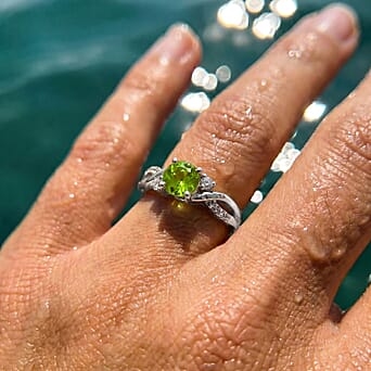 https://tjcuk.sirv.com/Products/85/8/8588093/Always-You-Peridot-Birthstone-Solitaire-Ring-with-Moissanite-Accents-i_8588093_2.jpg?w=342&h=342