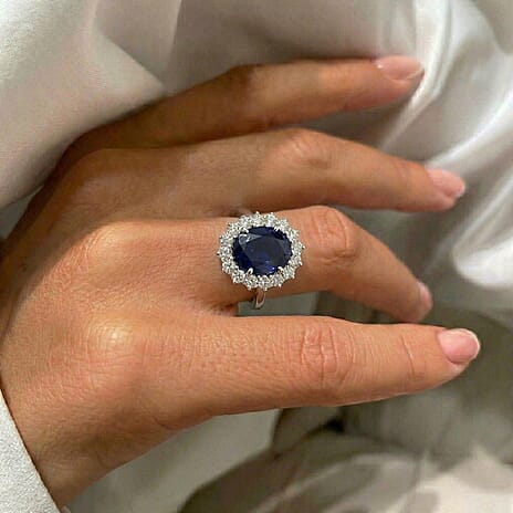 Luxuriant - Blue Sapphire (Oval 12x10 mm, 7.10Cts) & Lab Grown Diamond (SI-G-H, 1.00Cts) Halo Ring in Rhodium Overlay Sterling Silver 8.10 Ct.